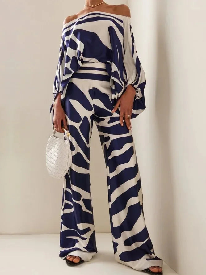 Elegant satin women's asymmetrical set with trousers