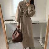 Női hosszú télikabát övvel, oversize fazonban | Elegáns