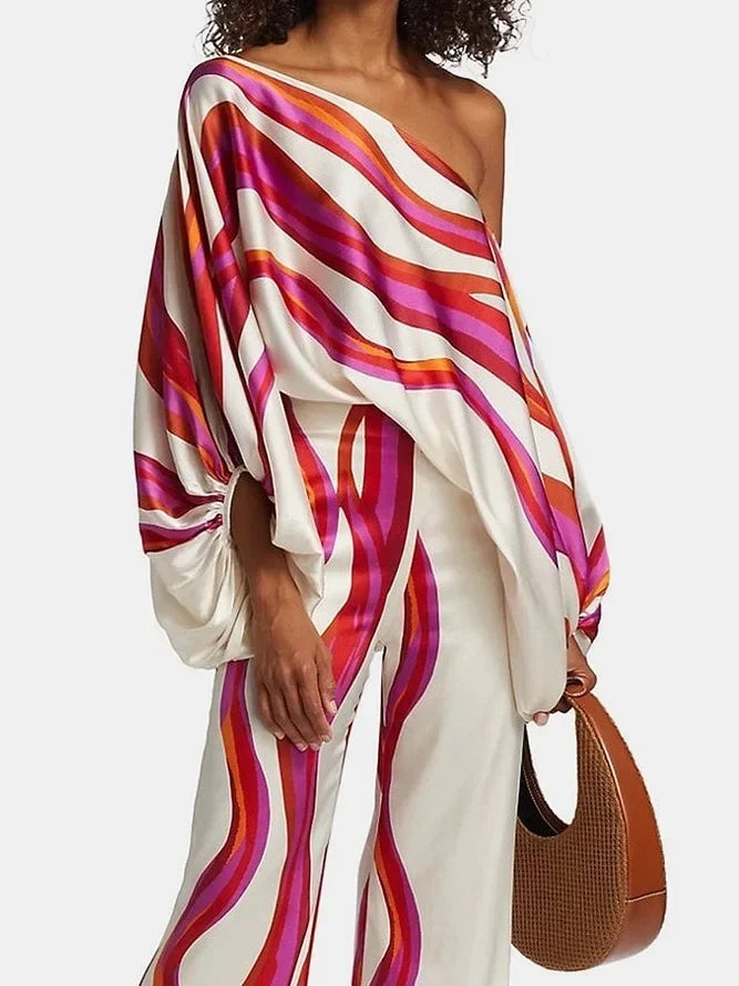 Elegant satin women's asymmetrical set with trousers