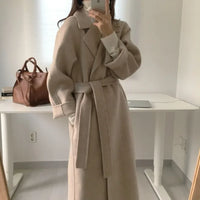 Női hosszú télikabát övvel, oversize fazonban | Elegáns