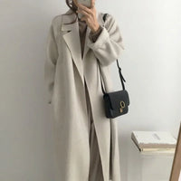Női hosszú télikabát övvel, oversize fazonban | Elegáns