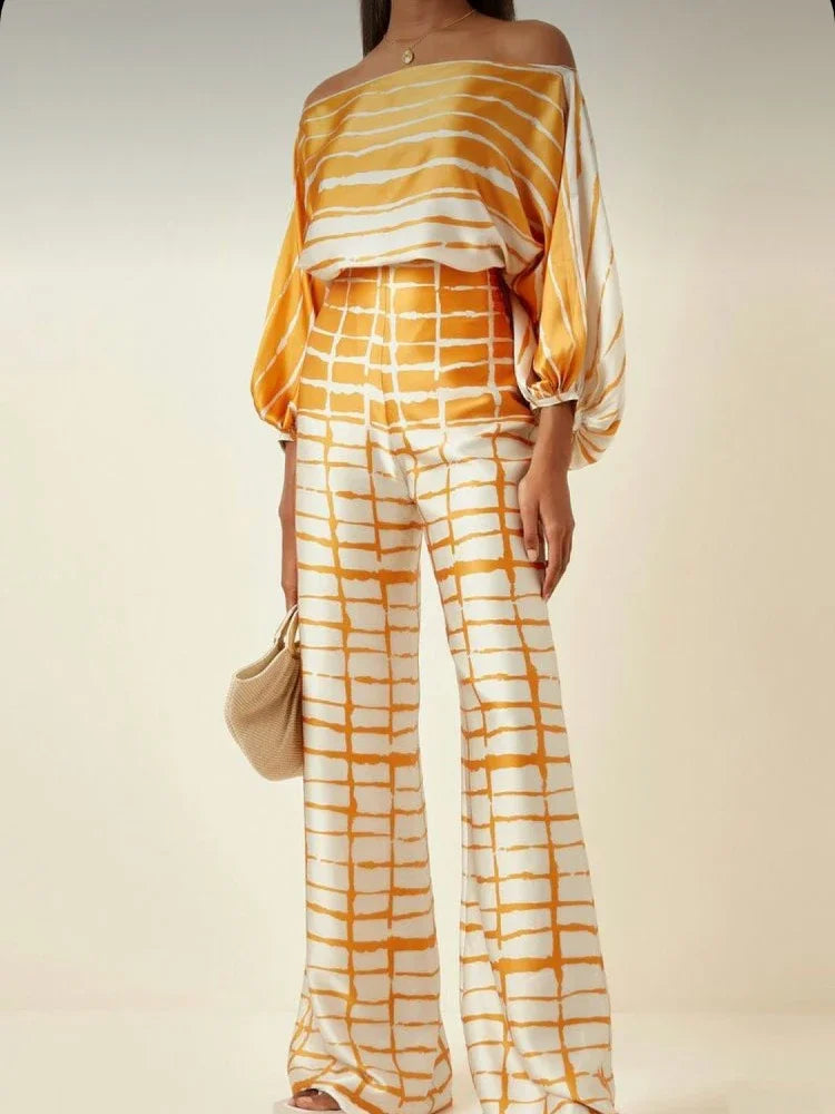 Elegant satin women's asymmetrical set with trousers