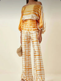 Elegant satin women's asymmetrical set with trousers