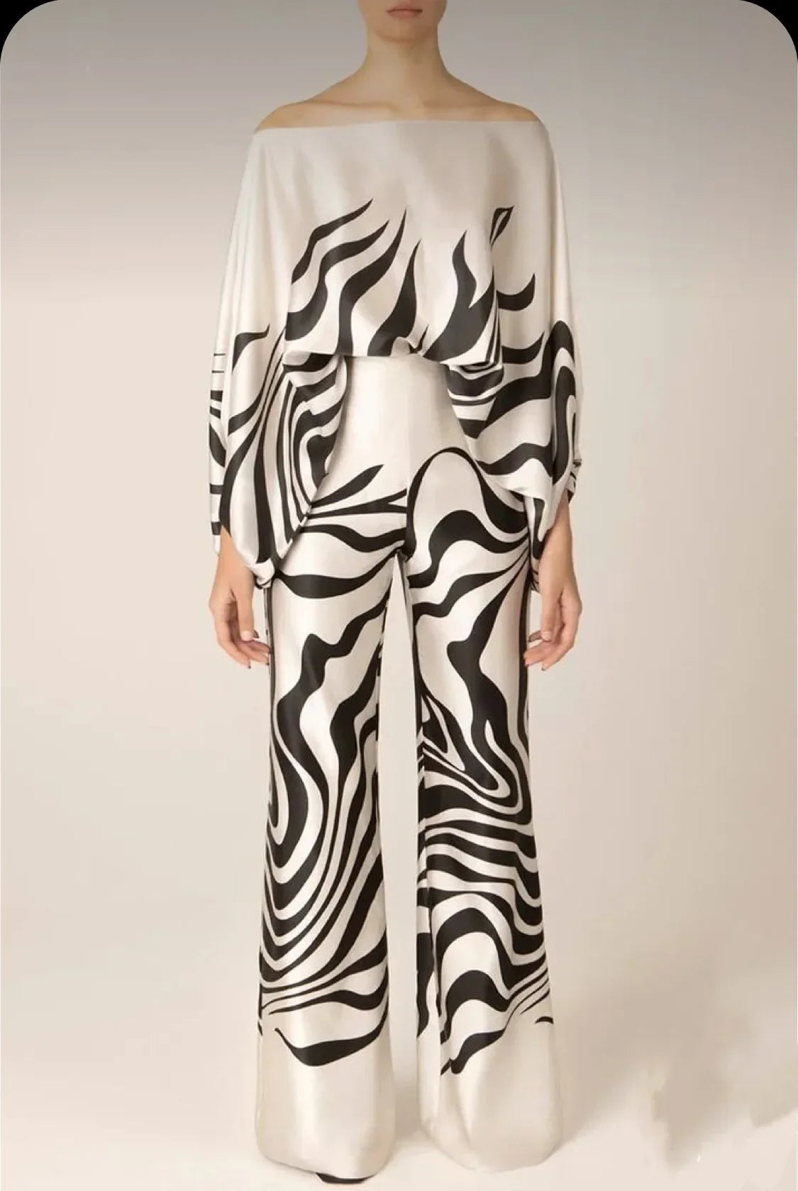 Elegant satin women's asymmetrical set with trousers