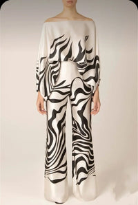 Elegant satin women's asymmetrical set with trousers