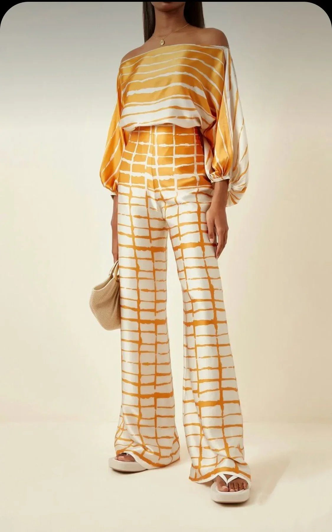 Elegant satin women's asymmetrical set with trousers