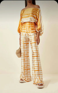Elegant satin women's asymmetrical set with trousers