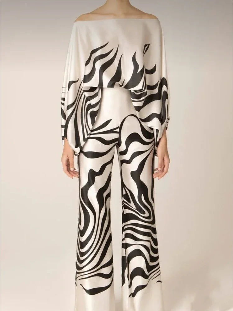 Elegant satin women's asymmetrical set with trousers
