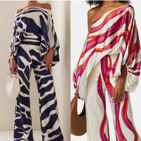 Elegant satin women's asymmetrical set with trousers